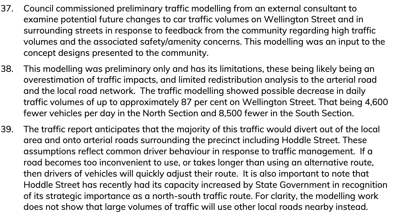 Excerpt from the council officer report (paragraphs 37 to 39): preliminary traffic modelling commissioned by Council, with limitations including likely overestimation of traffic impacts; expected daily traffic decreases on Wellington Street of up to 87 per cent (4,600 fewer vehicles per day in the North Section, 8,500 fewer in the South Section); majority of displaced traffic expected to divert to arterial roads not local streets, with explicit statement that the modelling does not show large volumes of traffic using other local roads nearby.